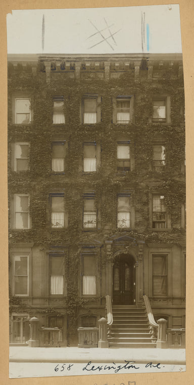 Brownstone row houses with stoops