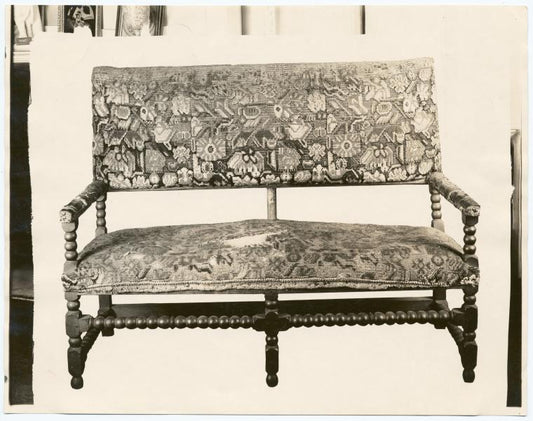 Turned upholstered settee.