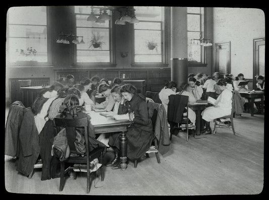 Work with schools, Tompkins Square : girls fill reading tables, school visit, April 13, 1910