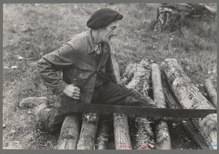Farmer sawing wood near Bradford, Vermont