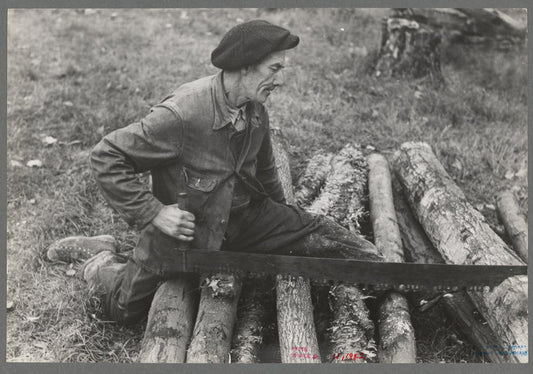 Farmer sawing wood near Bradford, Vermont