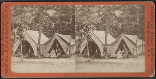 View of campers in front their tents.