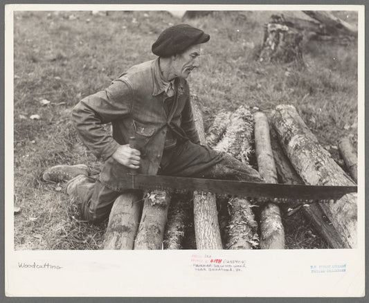 Farmer sawing wood near Bradford, Vermont