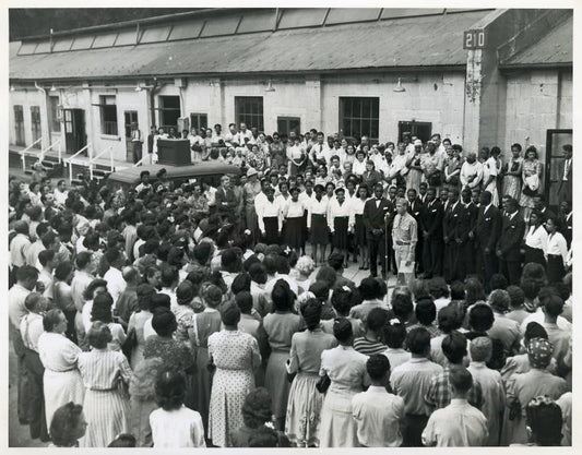 Workers at Labor Day exercises gather to hear a chorus of Arsenal workers sing spirituals; Picatinny Arsenal, Dover, N. J., 13 Dec. 1944