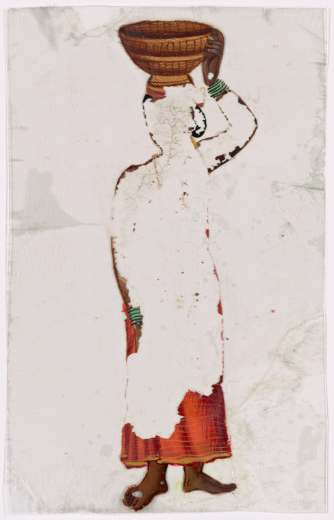 Woman in red sari with basket on head